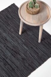 Homescapes Denver Leather Woven Rug in Black - Size: 90 cm x 150 cm - thumbnail 1