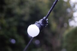 Xmas Haus G45 Bulb, E27 Base, Milky Plastic Cover Warm White in Clear - thumbnail 2