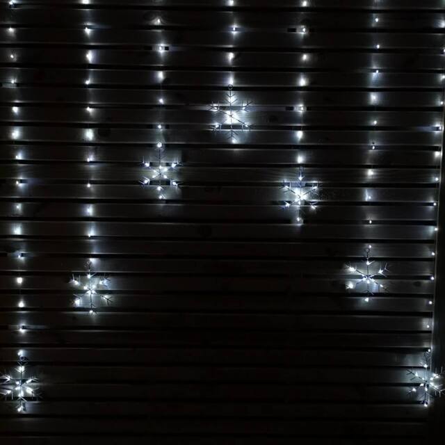Samuel Alexander 1.2m Battery Operated Snowflake Christmas Curtain Lights with 147 White LEDs - image 1