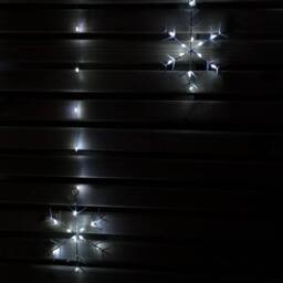 Samuel Alexander 1.2m Battery Operated Snowflake Christmas Curtain Lights with 147 White LEDs - thumbnail 3