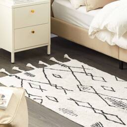 Wyld and Coco Heritage Off-White and Black Cotton 80 x 150 cm Geometric Tassel Rug in White - Size: 80 cm x 150 cm - thumbnail 1