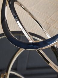 Orsina Clear Glass End Table With Warm Metallic Frame, Luxe Interlocking Gold Ring Base, Modern Glass Top in Silver - thumbnail 2