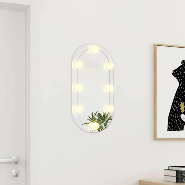 Berkfield Home Mirror with LED Lights 60x30 cm Glass Oval in Silver - image 1