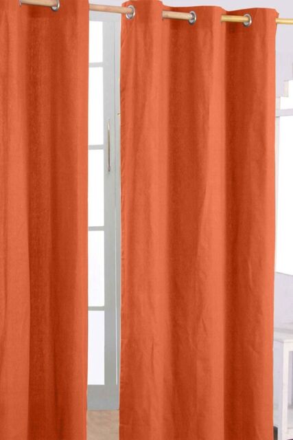 Homescapes Plain Cotton Ready Made Eyelet Curtain Pair in Burnt Orange - Size: 140 cm width x 183 cm drop - image 1