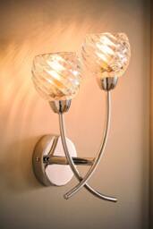 ValueLights Reyka Chrome 2 Way Swirl Glass Wall Light with Bulbs in Metallic Silver