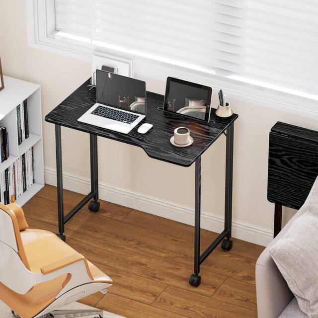 HOMCOM Small Writing Desk with Wheels, Folding Study Table in Black - image 1
