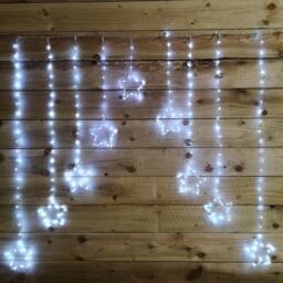 Samuel Alexander 1.2m x 1.2m Light up Star Pin Wire Christmas Curtain Lights with 303 White LEDs - thumbnail 4