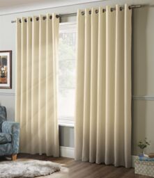 Luxury Living Plain Blackout Ring top Curtains in Cream - Size: 117 cm width x 183 cm drop