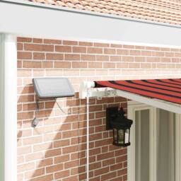 Berkfield Home Manual Retractable Awning with LED Orange & Brown 600x350 cm - thumbnail 4