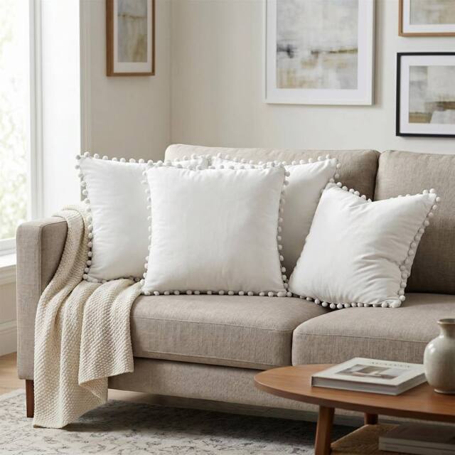 Luxury Living Set of 4 Velvet Cushions with Pom Trim with pads in Cream - Size: 43 cm x 43 cm - image 1