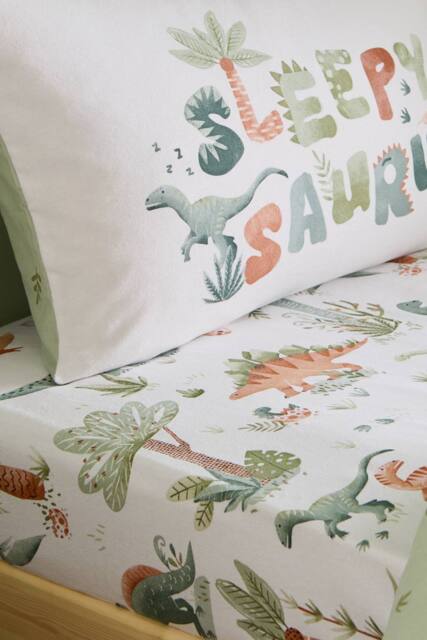 Catherine Lansfield 'Brushed Sleepy Saurus Dino' Cotton Fitted Sheet in Cream - Size: Junior - image 1