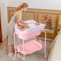 Costway Baby Changing Table Folding Infant Diaper Changing Nursery Station With Bathtub in Pink - image 1