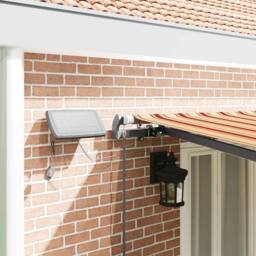 Berkfield Home Manual Retractable Awning with LED Yellow & Orange 600x300 cm - thumbnail 4