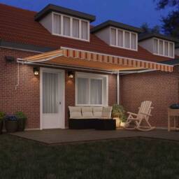 Berkfield Home Manual Retractable Awning with LED in Yellow & Orange, 450x300 cm - thumbnail 1