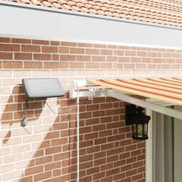 Berkfield Home Manual Retractable Awning with LED in Yellow & Orange, 450x300 cm - thumbnail 4