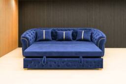 Stratus Interiors Ambassador Premium Tufted Velvet Sofa Bed with Elegant Gold Trim in Dark Blue