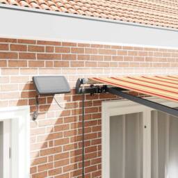 Berkfield Home Manual Retractable Awning with LED Yellow & Orange 350x250 cm - thumbnail 4