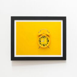"Warren Reed - Designer Yellow Alarm Clock Framed Art Print in Black - Size: W8"" x H10""" - thumbnail 1