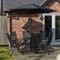 Samuel Alexander Outdoor 6 Person Glass Top Dining Table Chairs. Black Parasol & Base - thumbnail 2