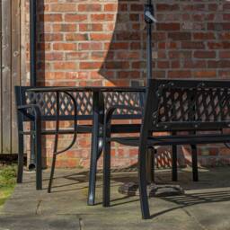 Samuel Alexander Outdoor 4 Person Glass Top Garden Table Benches, Parasol & Base Set in Black - thumbnail 2