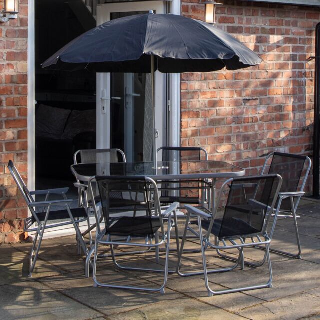 Samuel Alexander 6 Person Garden Furniture Patio Set Table, 6 Chairs & Parasol with Black Glass - image 1