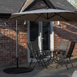 Samuel Alexander 4 Person Round Glass Top Table Chairs. Grey Banana Lit Parasol & Base in Black - thumbnail 2