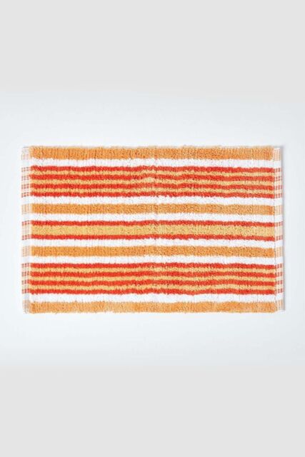Homescapes Handloomed Striped Cotton Bath Mat in Orange - image 1