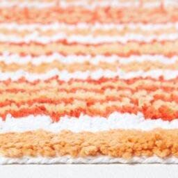 Homescapes Handloomed Striped Cotton Bath Mat in Orange - thumbnail 3