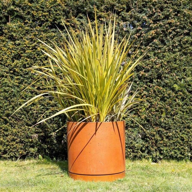 Primrose Matte Rust Limestone Round Planter Pot with Saucer 50cm in Orange - image 1