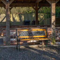Samuel Alexander 2 Seater Outdoor Wooden Cast Iron with Lattice Design Garden Patio Bench in Brown - thumbnail 2