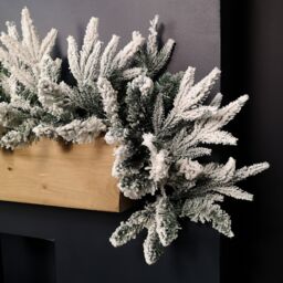 Samuel Alexander 1.8m Snow Flocked Lapland Christmas Garland with 150 Tips in Green - thumbnail 3