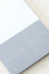 The Tiny Bed Company Premium 100% Cotton Fitted Sheet For Travel Cot 95 x 65cm in White - thumbnail 1