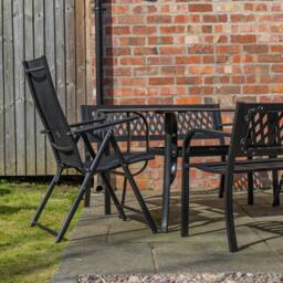 Samuel Alexander Outdoor 6 Person Glass Top Garden Table Benches & Chairs Set in Black - thumbnail 7