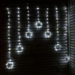 Samuel Alexander 1.2m Battery Operated Christmas Star Curtain Lights with 140 White LEDs - thumbnail 1