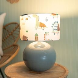 ValueLights Bosco Eucalyptus Teal Globe Ceramic Table Lamp with Cartoon Dino Shade & Bulb - thumbnail 1