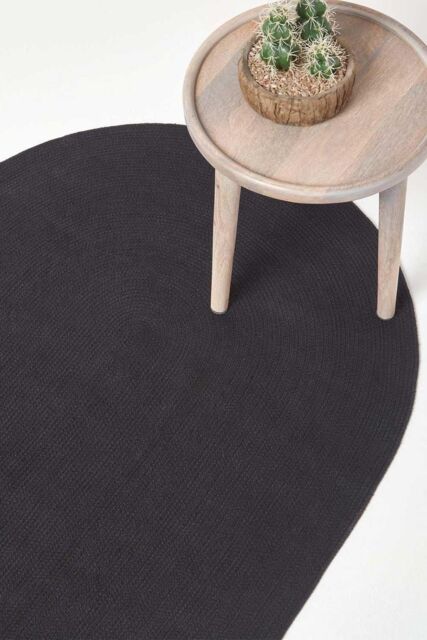 Homescapes Handmade Woven Braided Oval Rug in Black - Size: 150 cm diameter - image 1