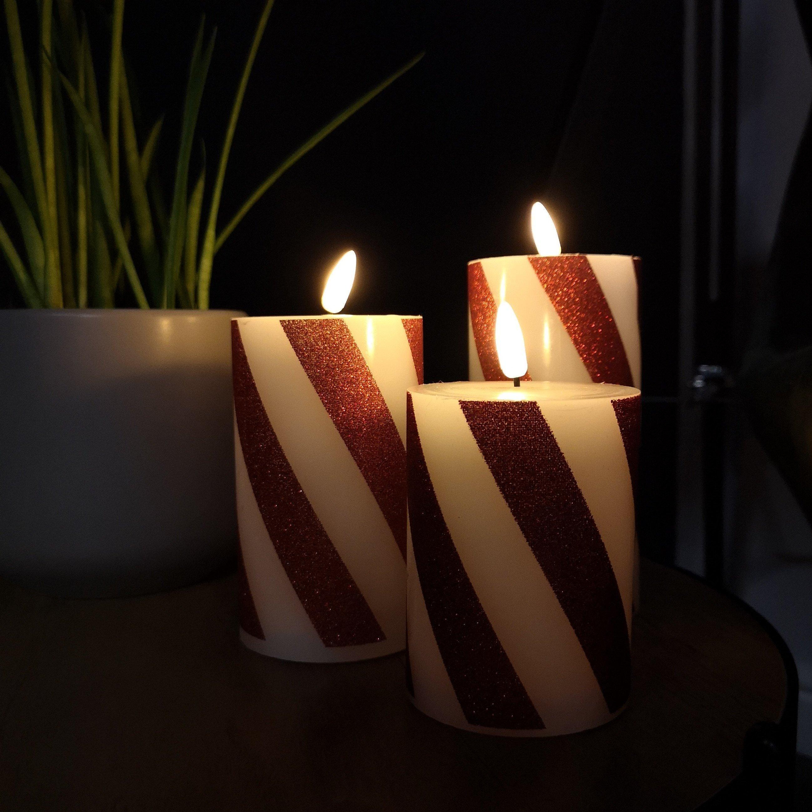 Set of 3 LED Red and White Stripe Flickering Wax Candle Christmas Decoration - image 1