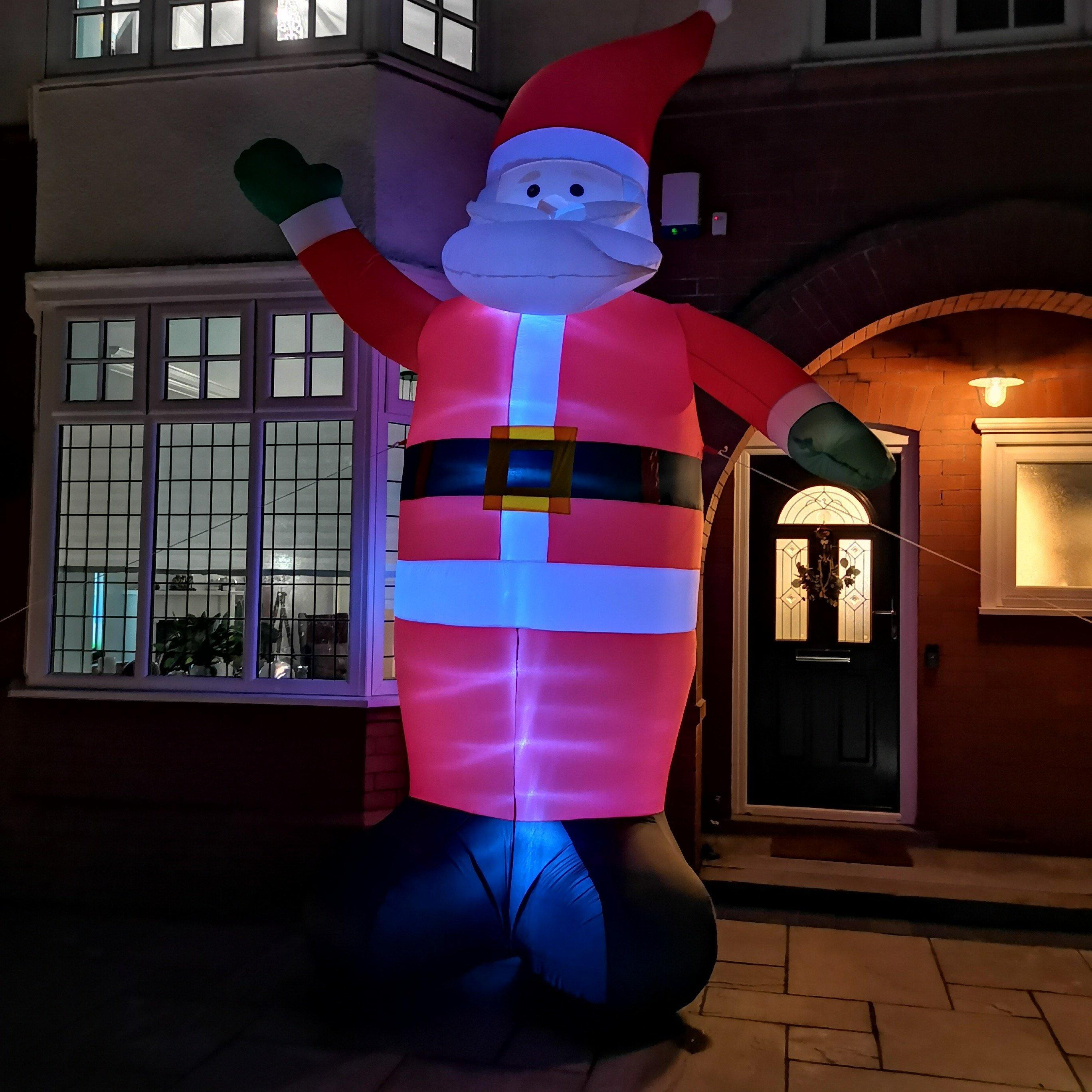 GIANT: 13ft (4m) Outdoor Inflatable Light up Christmas Santa with Raised Arm with LEDs - image 1
