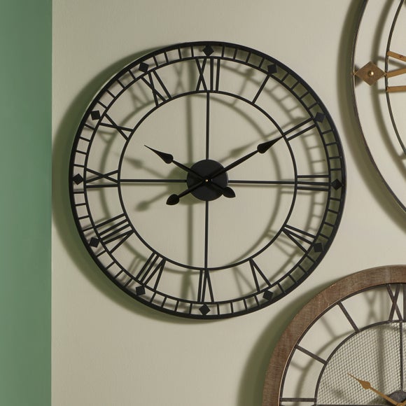 Black Metal Skeleton Wall Clock - image 1