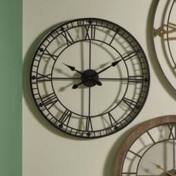 Black Metal Skeleton Wall Clock - thumbnail 1
