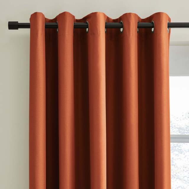 Berlin Blackout Eyelet Curtains Orange Umber