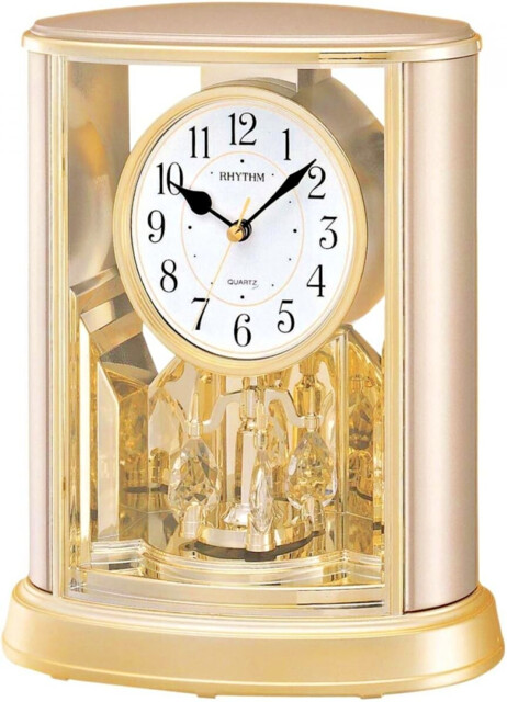 Rhythm Mantel Clock 2 Tone Oval Rotating Pendulum Crystal Arabic Dial