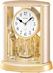 Rhythm Mantel Clock 2 Tone Oval Rotating Pendulum Crystal Arabic Dial