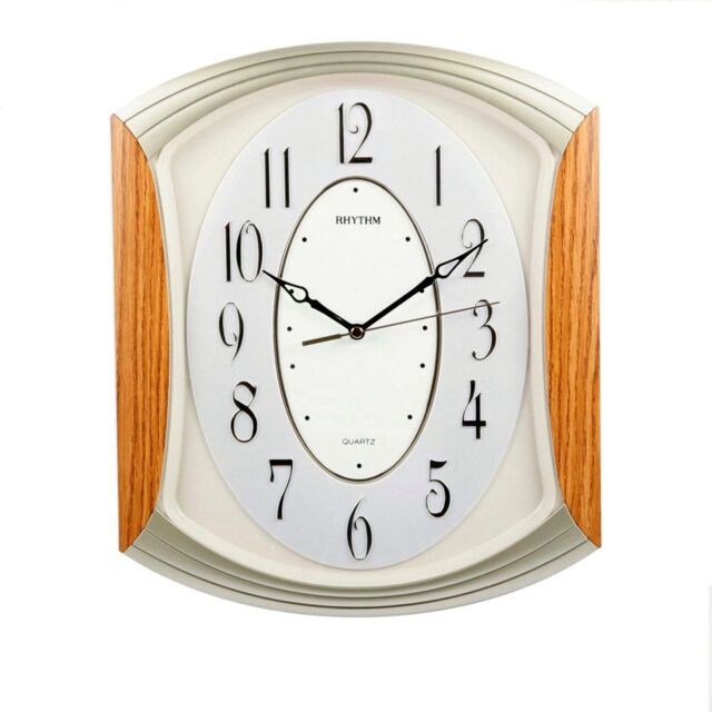Rhythm Wood Effect And Gold Quartz Wall Clock With Silent Sweep