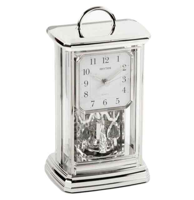 Rhythm Silver Oblong Mantel Clock With Rotating Pendulum 4sg771wr19
