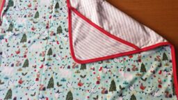 Frugi Little Hug Arctic Aqua Let's Party Hooded Blanket Christmas