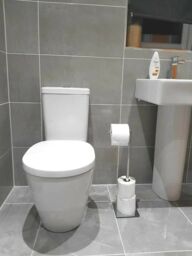 Chrome Toilet Roll Holder Stand Swivel Free Standing Holds Extra Rolls