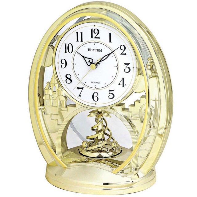 Rhythm Quartz Mantel Clock Gold Oval Rotating Pendulum Arabic Dial