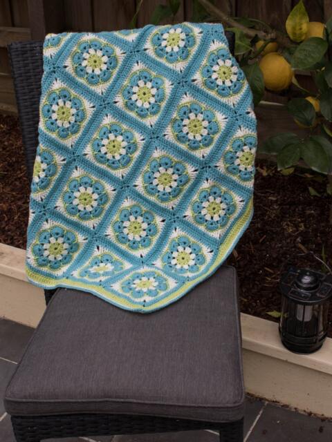 African Rose 100% Wool Baby Blanket in Light Blue, Green & Cream - image 1