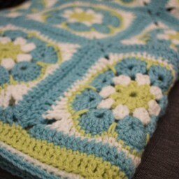 African Rose 100% Wool Baby Blanket in Light Blue, Green & Cream - thumbnail 3